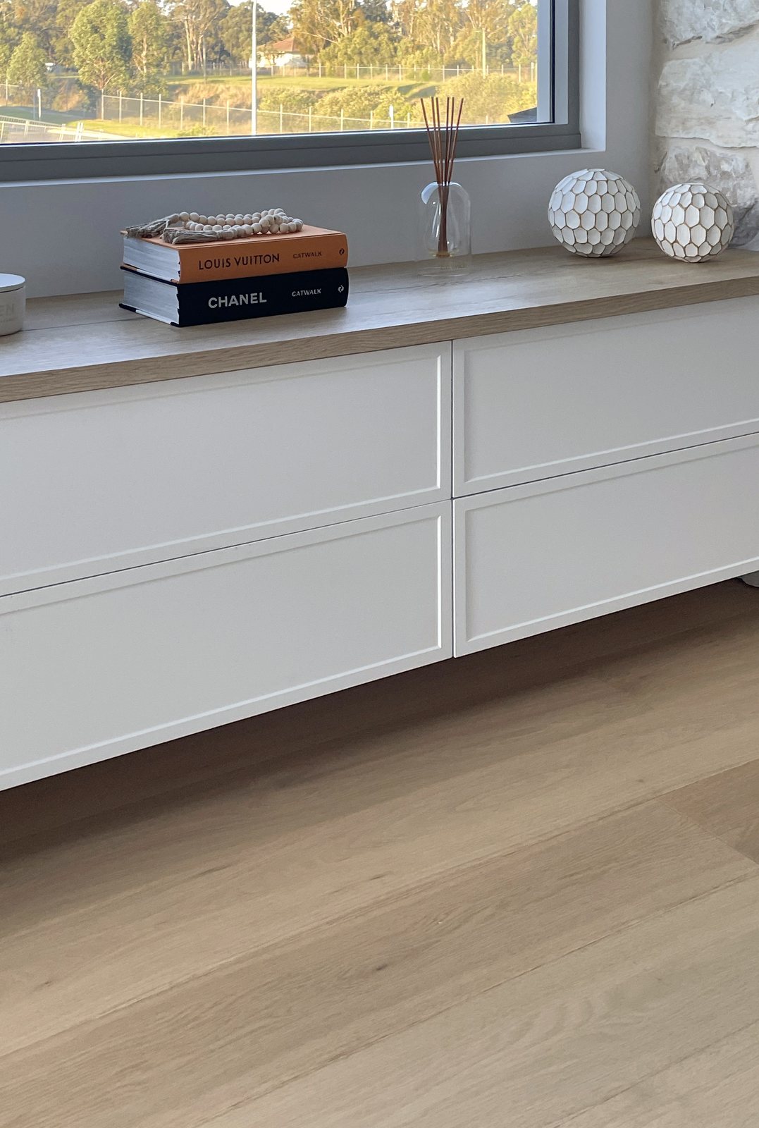 Autograph completed custom cabinetry