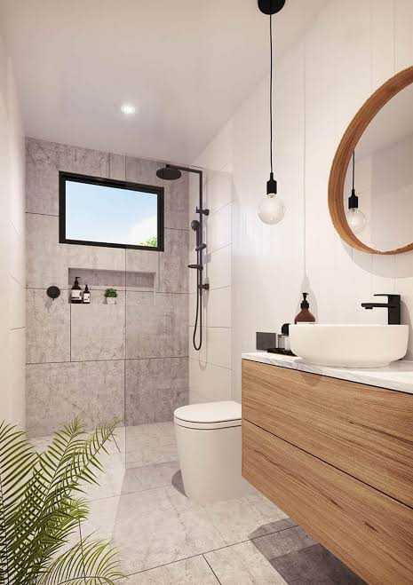 Compact contemporary bathroom completed by Autograph Kitchens and Bathrooms